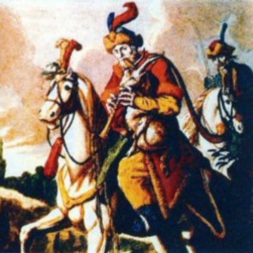 Szimplasípszáras kecskefejes dudán játszó magyar lovassági dudás Martin Engelbrecht metszetén. (1740–1748)